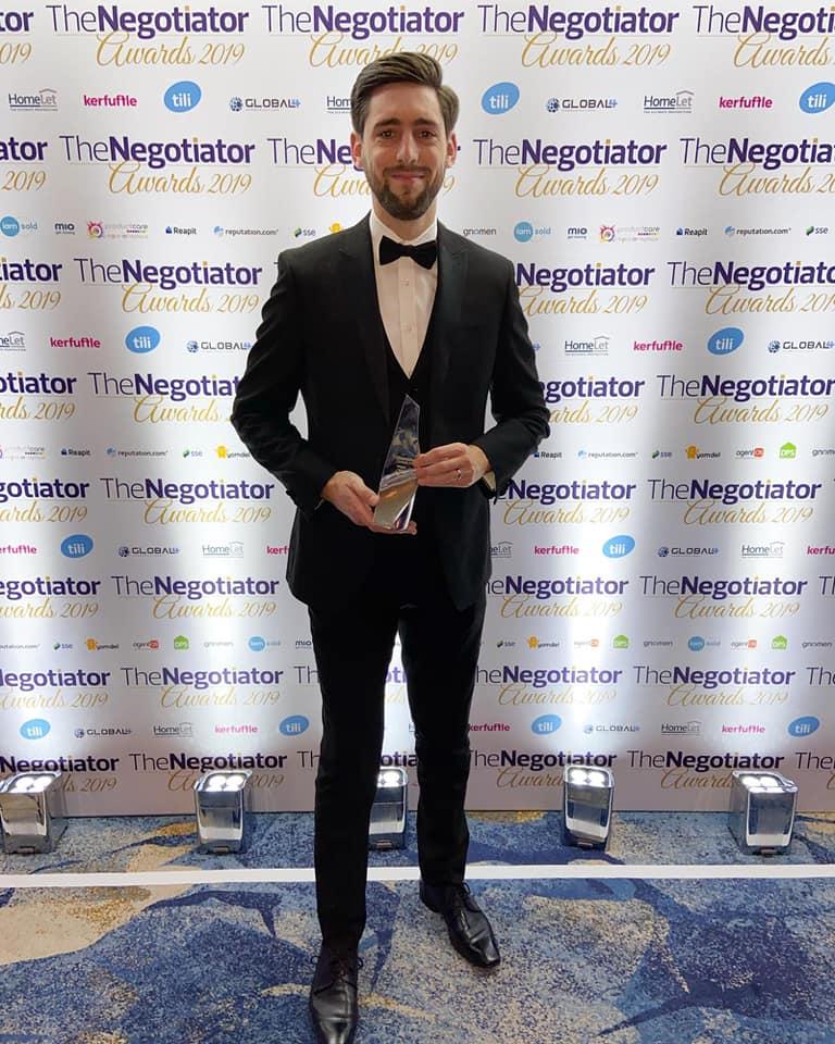 Jon Brown, of BuckleyBrown Estate Agents, receiving his award in London.
