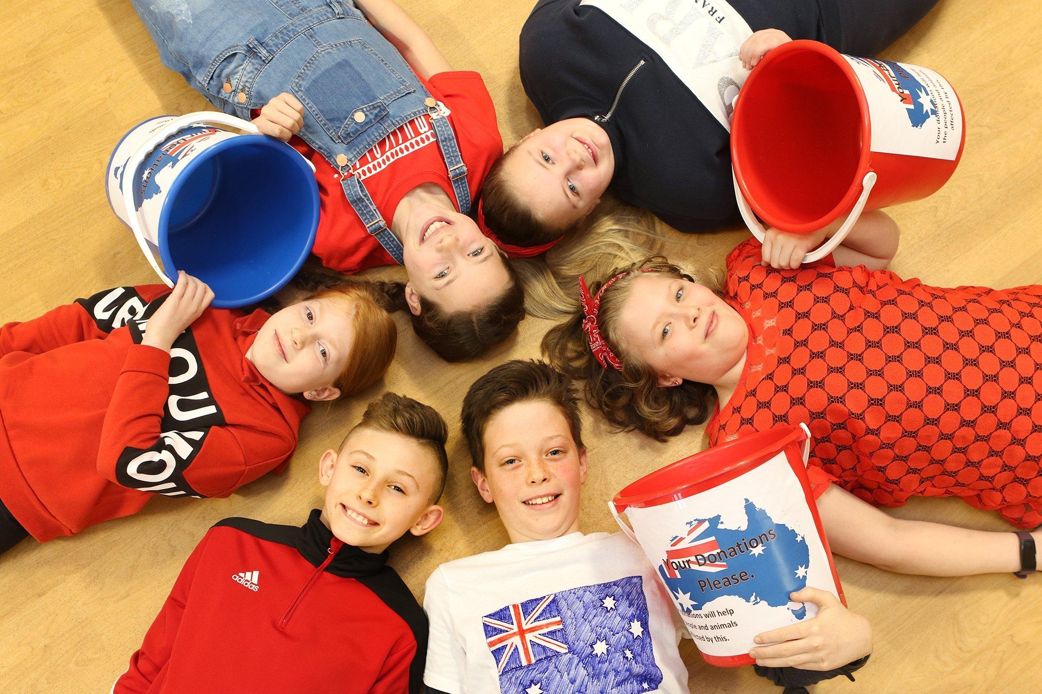 Australian Hamish Barnes, bottom middle, with fellow Year 6 fundraisers.