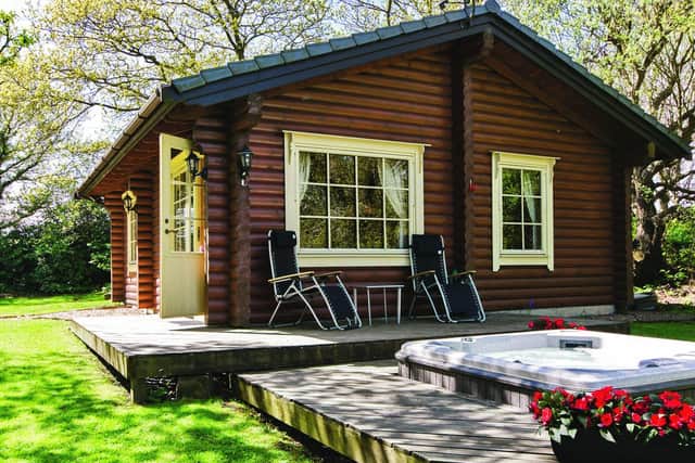 The exterior and hot tub at Faweather Grange