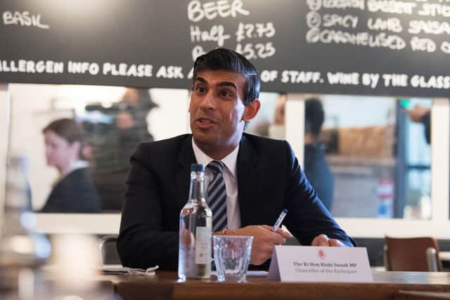 Rishi Sunak says young people should return to offices for the benefit of their careers (Photo by Stefan Rousseau-WPA Pool/Getty Images)