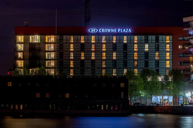 The word open lights up the Crowne Plazain Docklands London to mark the reopening of Hotels on the 17th of May.