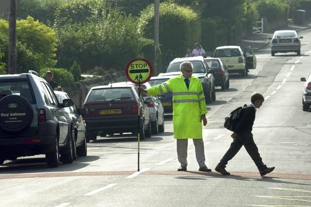 Children are being urged to look up from their phones when they cross the road, in a new safety campaign by children's newspaper First News (Photo by National World)