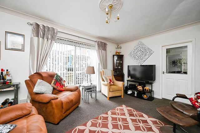 The welcoming lounge provides a comfortable setting for relaxing with family or hosting guests.