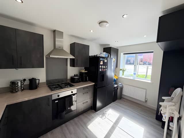 The thoughtfully designed kitchen has been enhanced with additional storage to make everyday living even easier.