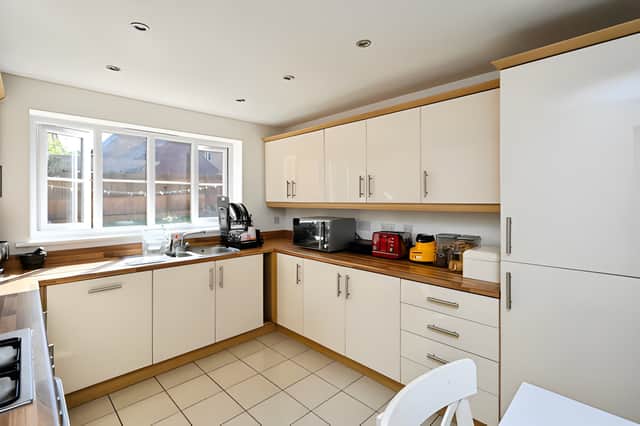 The modern kitchen provides plenty of worktop space and storage