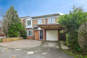 Set in a peaceful Mansfield Woodhouse cul-de-sac, this detached family home offers generous accommodation alongside driveway parking and a garage