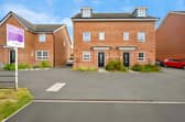The modern three-storey home on Lindhurst Way West offers generous family accommodation alongside a private garage