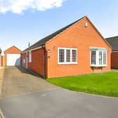 The Pavilion Gardens frontage introduces a well-presented detached bungalow with driveway parking and a garage