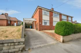 The Abbott Road home offers a practical arrival with off-road parking and a semi-detached layout