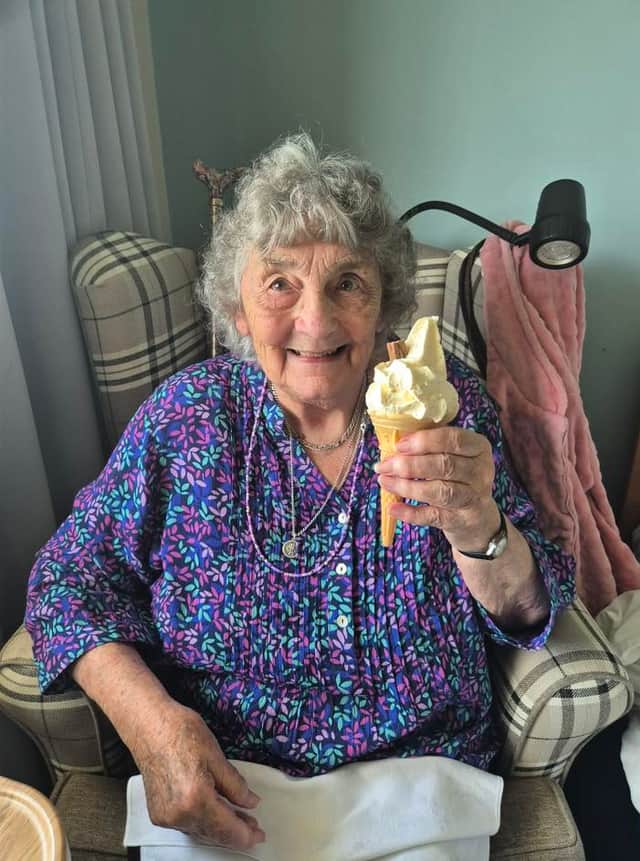 A resident at Edingley Lodge enjoying an ice-cream