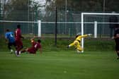 Ben Moore wheels away as his strike rockets into the net