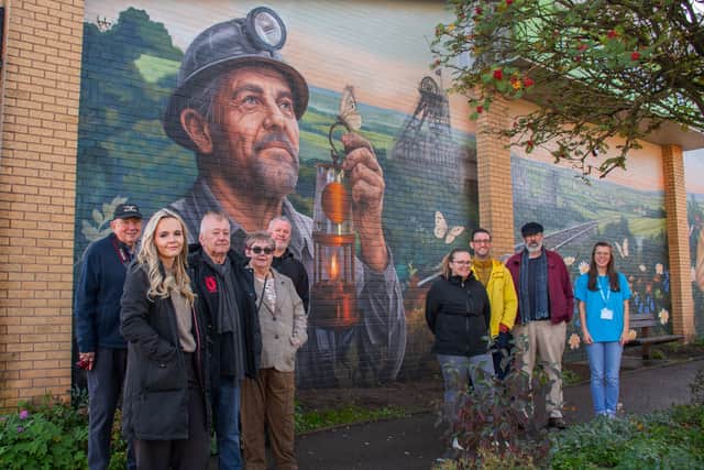 Council officers pictured with members of the Teversal, Stanton HIll and Skegby Neighbourhood Forum and the artist, Anthony Donnelly