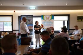 Katie of the Children's Bereavement Centre, with Mark Cotes, Managing Director of Barratt and David Wilson Homes North Midlands  