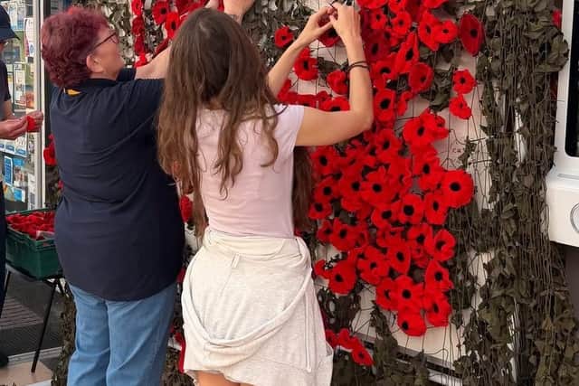 Volunteers and Community Ambassadors at the ATTFE Hub have also made an incredible contribution, creating a giant camouflage net adorned with hundreds of hand-knitted poppies.