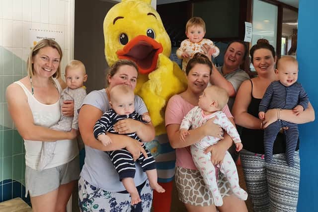 Parents and children from Puddle Ducks swim school, ready for their PJ swim