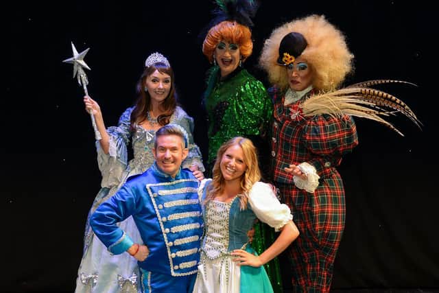 The cast of Cinderella -  Melanie Walters as the Fairy Godmother, Adam Moss as Buttons, Olivia Birchenough as Cinderella and Jamie Morris and Tarot Joseph as the Ugly Sisters.