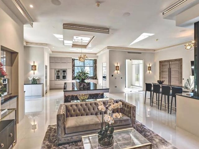 This luxury mansion comes with seven bedroom suites, staff accommodation, state of the art security systems, spa suite with a swimming pool and a cinema with acoustic screenings. Guide price 7,500,000 GBP