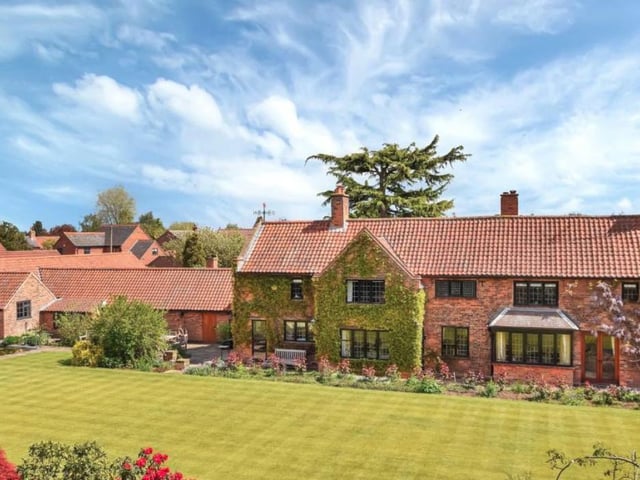 This property is a converted former Tithe barn of Magdalene College from the early 20th century. It boasts a wealth of character and comes with five bedrooms, tennis court and cricket ground. Guide price 2,000,000 GBP