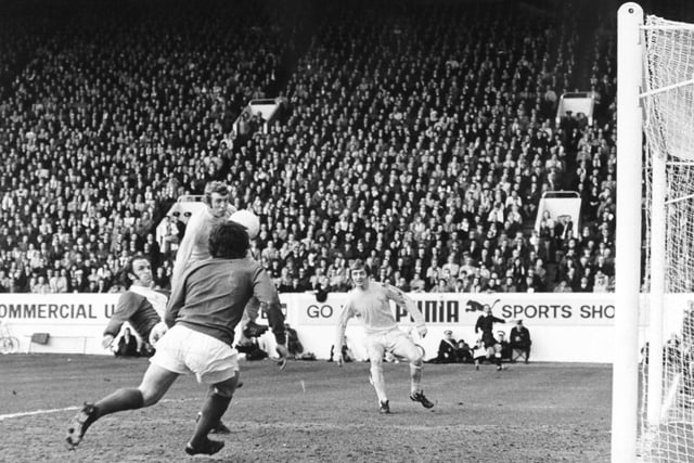 Mick Jones is on the spot as Tommy Carroll attempts to clear. The ball  hit Jones on the chest and went in to clinch United's win against Birmingham City in April 1972.