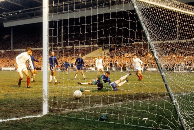 Mick Jones scores during the 1970 FA Cup final against Chelsea at Wembley.