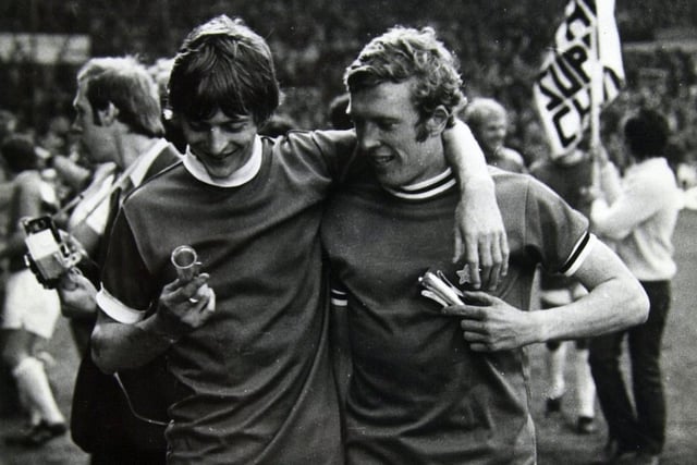 Allan Clarke and Mick Jones, wearing Juventus shirts, look at their winners medals after the 1971 Inter-Cities Fairs Cup final.