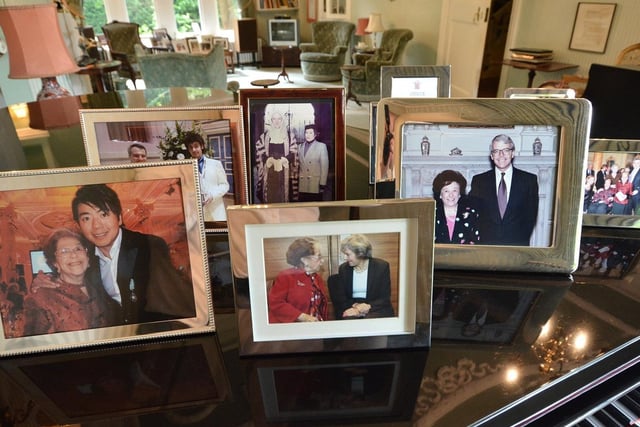 Dame Waterman has hosted many famous people in her home and photographs can be seen throughout the house.