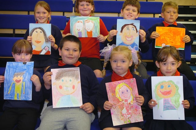 The winners of a recent portrait competition at Revoe School in Blackpool, who will have their pictures printed as postcards. Front left to right: Amy Pugh, Anthony Marchant, Amelia Fitzpatrick and Megan Green. Back: Catherine Harwood, Hannah Power, Nathan Wignall and Conner Brown