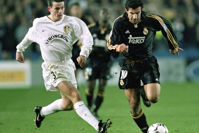 Ian Harte chases down Luis Figo as two goals in as many second-half minutes saw Real Madrid seal victory at Elland Road.