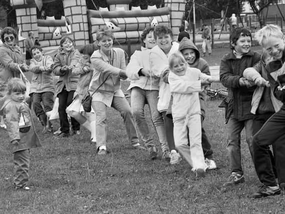 Pulling together in aid of the Children's Wheelchair Fund and Wigan Hospice during a fun day at Goose Green, 1987.