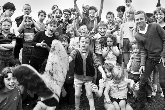 Giving it some wellie in Whelley! Youngsters at a fun day at Whelley Labour Club get the boot in with some wellie throwing in 1982.
