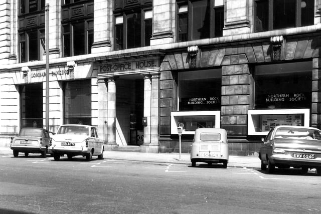 Infirmary Street showing Post Office House, home to Lombard Banking Ltd. and Northern Rock Building Society, among others.