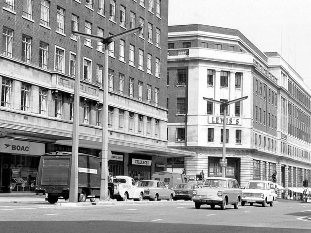 The Headrow from the junction with Albion Street in June 1967. To the left is Headrow House with shops on the ground floor including B.O.A.C. and Vallance's radio and television engineers.