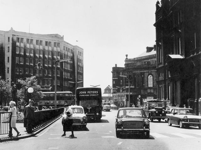 Infirmary Street across City Square before the site was redeveloped following the closure of the road seen in the foreground which ran between the square itself, seen on the left, and the General Post Office Building.