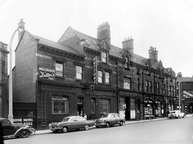 Woodhouse Lane. On the left is the Tymms Hotel public house. The landlord at this time was George Burnett. The junction with Cookridge Street is just visible on the right edge. Pictured in 1960.