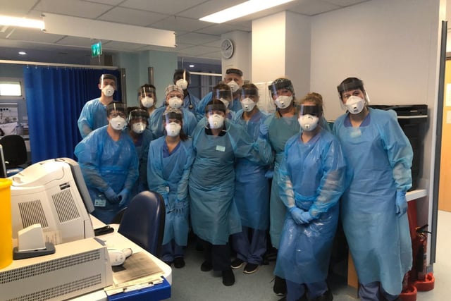 Staff on the Acute Respiratory Care Unit in full PPE during the pandemic.