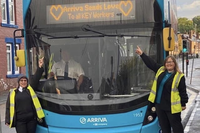 Arriva Yorkshire staff are pictured with a bus paying tribute to key workers.