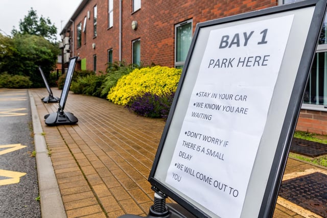 Designated parking bays have been set up in the car park so doctors can attend to patients outside if they need to be screened for COVID or have symptoms.