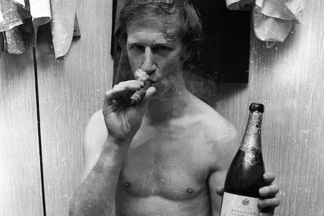 Big Jack enjoys a cigar and a bottle of bubbly after Leeds beat Juventus to win the Inter-Cities Fairs Cup in 1971.
