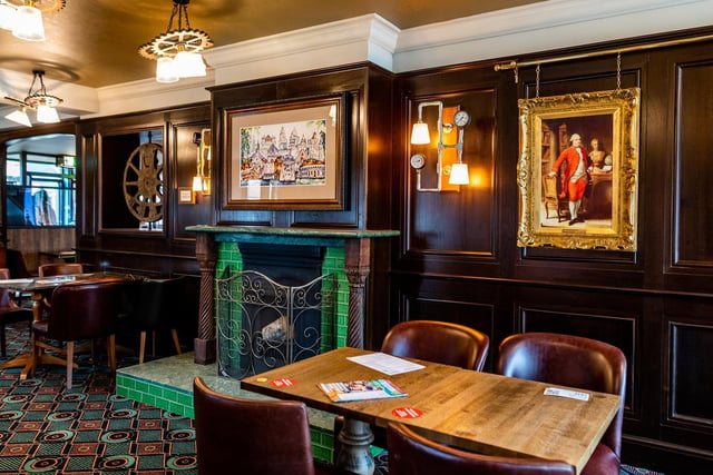 Historical photos and details of local history, as well as artwork and images of local scenes and characters, are displayed in the pub, along with bus-related artefacts.