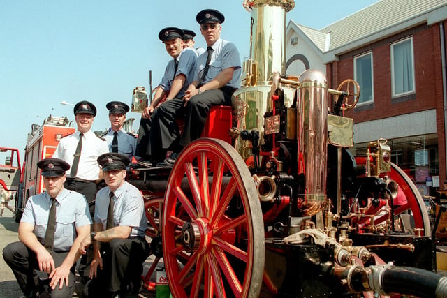 Firefighters from Fleetwood Station trying out an 1898 Shand-Mason horse-drawn engine