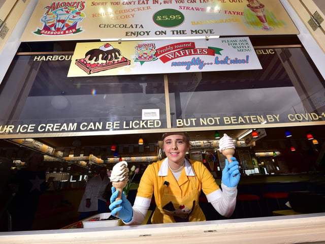 The new exterior serving area with Tori Dawson and a Covid-19 message.
It reads: "Our ice cream can be licked but not beaten by Covid-19"