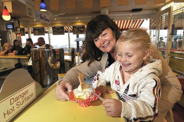 The cafe is popular with all ages. Olivia Cockerill enjoys her ice cream treat with her Nan Jacqueline Rogerson