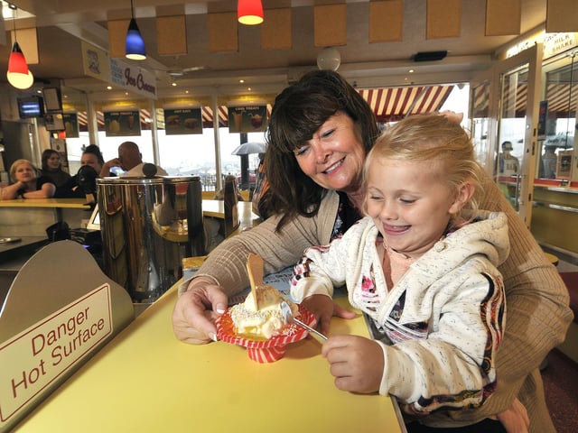 The cafe is popular with all ages. Olivia Cockerill enjoys her ice cream treat with her Nan Jacqueline Rogerson