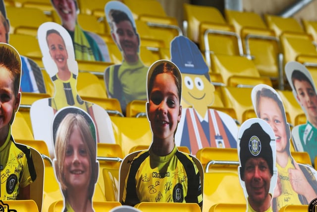 The CNG stadium is filled with cut-outs of supporters.