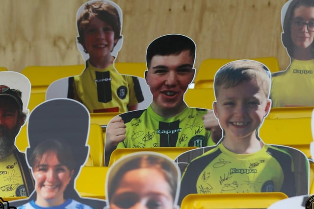The CNG stadium is filled with cut-outs of supporters.