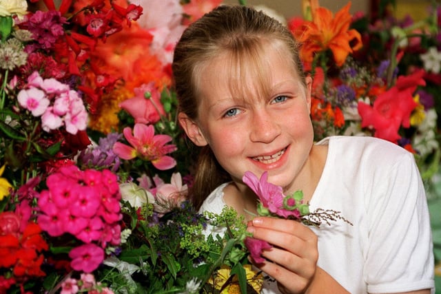 Ten year old Abigail Saunt of Rotherwick Avenue, Chorley, with some of the cut flowers on show