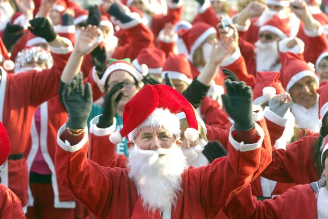 The annual Santa Dash in aid of Trinity Hospice is one of Blackpool's most eye-catching events as thousands of jolly Santas - plus a few dogs - take part in a sponsored jog along Blackpool Promenade.