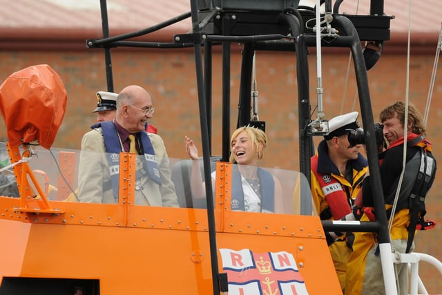 Miss Regatta Dionne Hewison takes a ride on the lifeboat