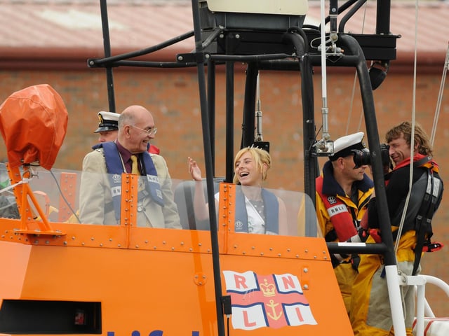 Miss Regatta Dionne Hewison takes a ride on the lifeboat