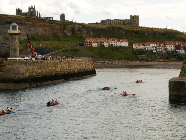 Keen competition in the rowing races.